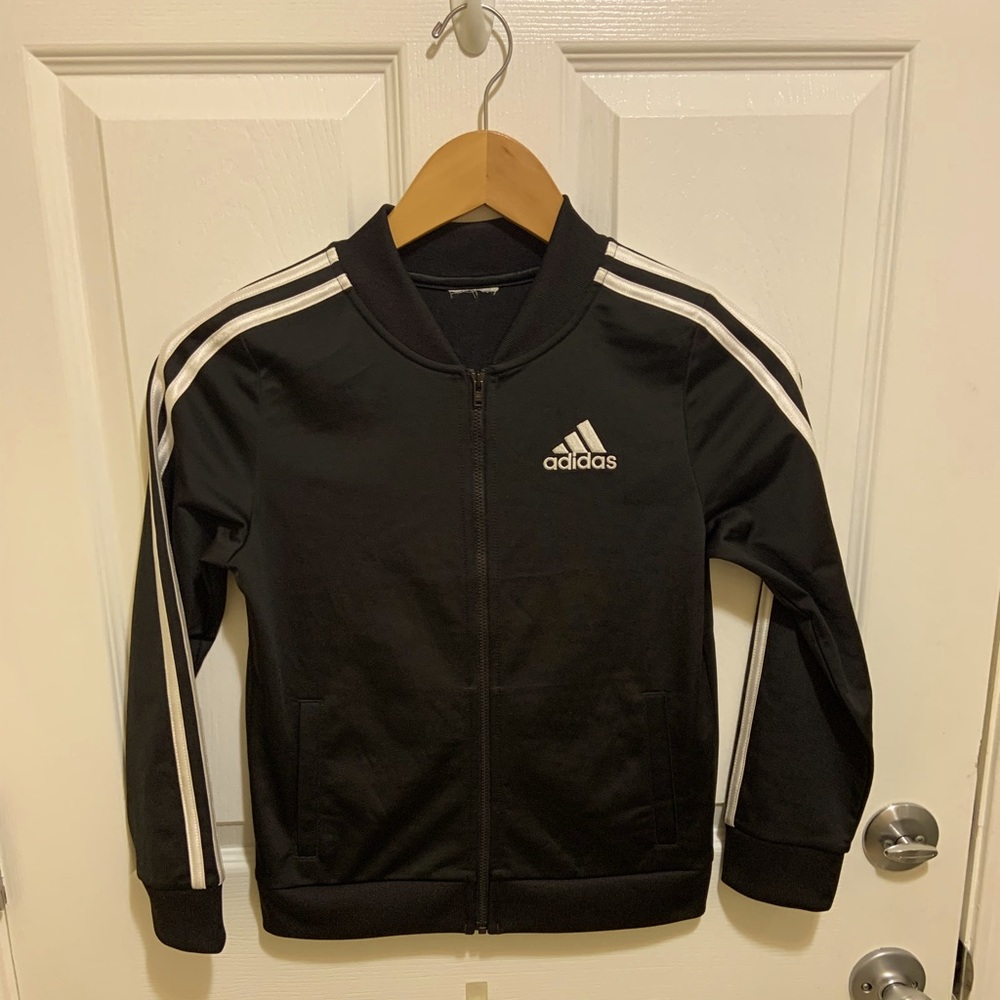 Boys ADIDAS track jacket in Black. Like new. Only worn a few times…